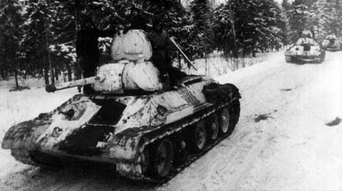 Танки 1-й бронетанковой бригады в камуфляже "зимний лес" Танки Т-34